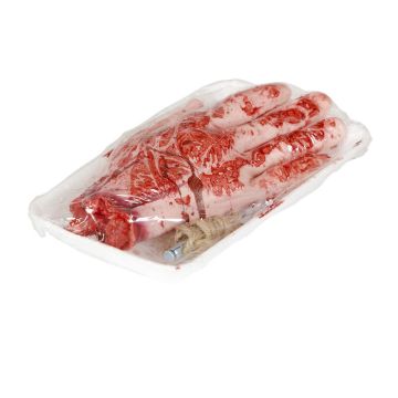 Blodig avhuggen hand i köttförpackning