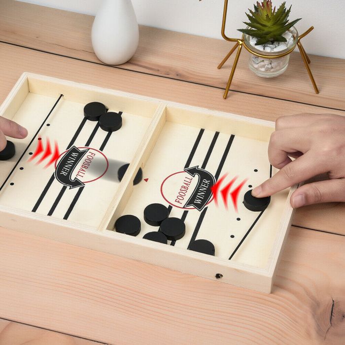 Flying Sling Puck Game
